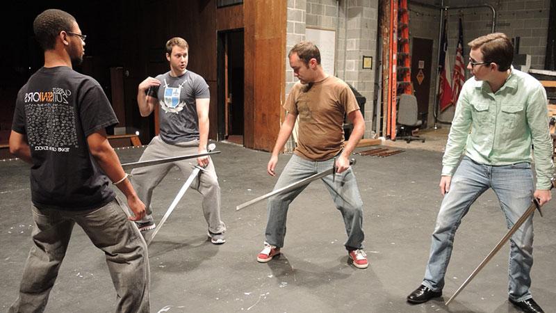 Students at a stage combat workshop