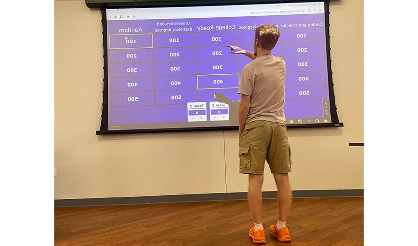 Student playing jeopardy.